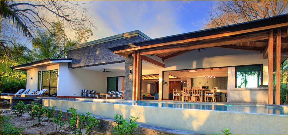 Nicoya Peninsula Beachfront Villa for rent luxury Costa Rica vacation rental by private owner.  Spectacular 6 bedroom, 6.5 bath shimmering beachfront Pool.